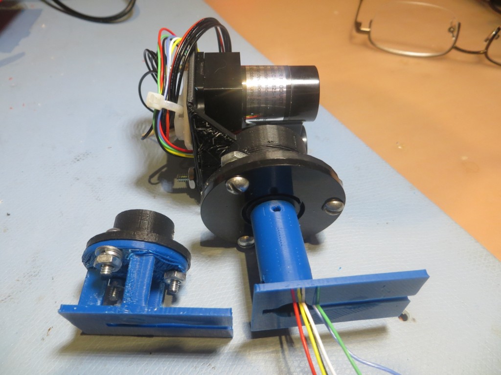 Original  and 2nd versions of the LIDAR slip ring assembly mount