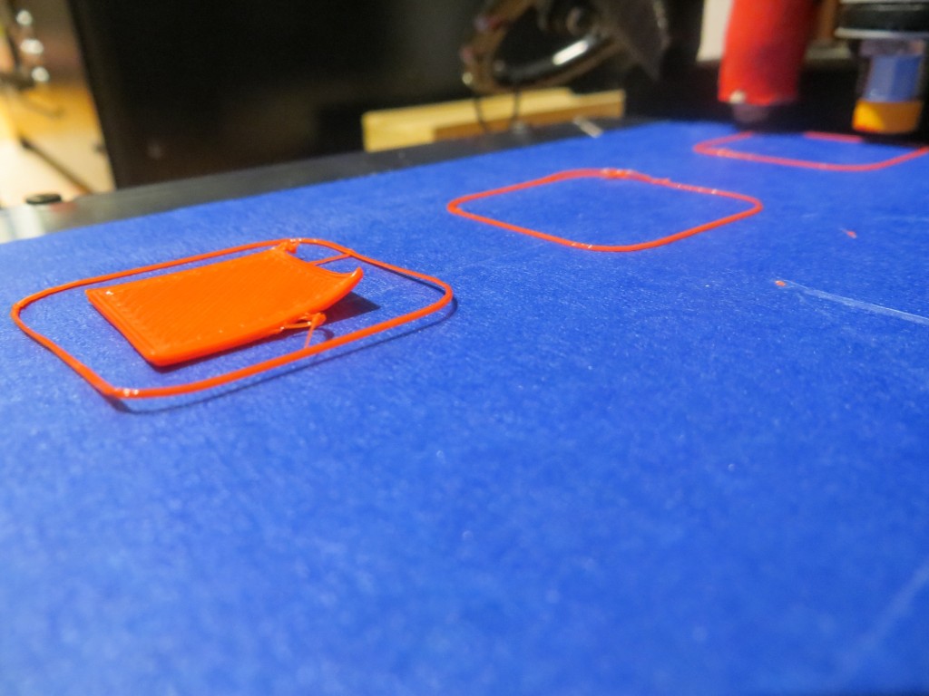 2nd try at printing 20mm cal cube at the third position (0,53). Note the raised corner