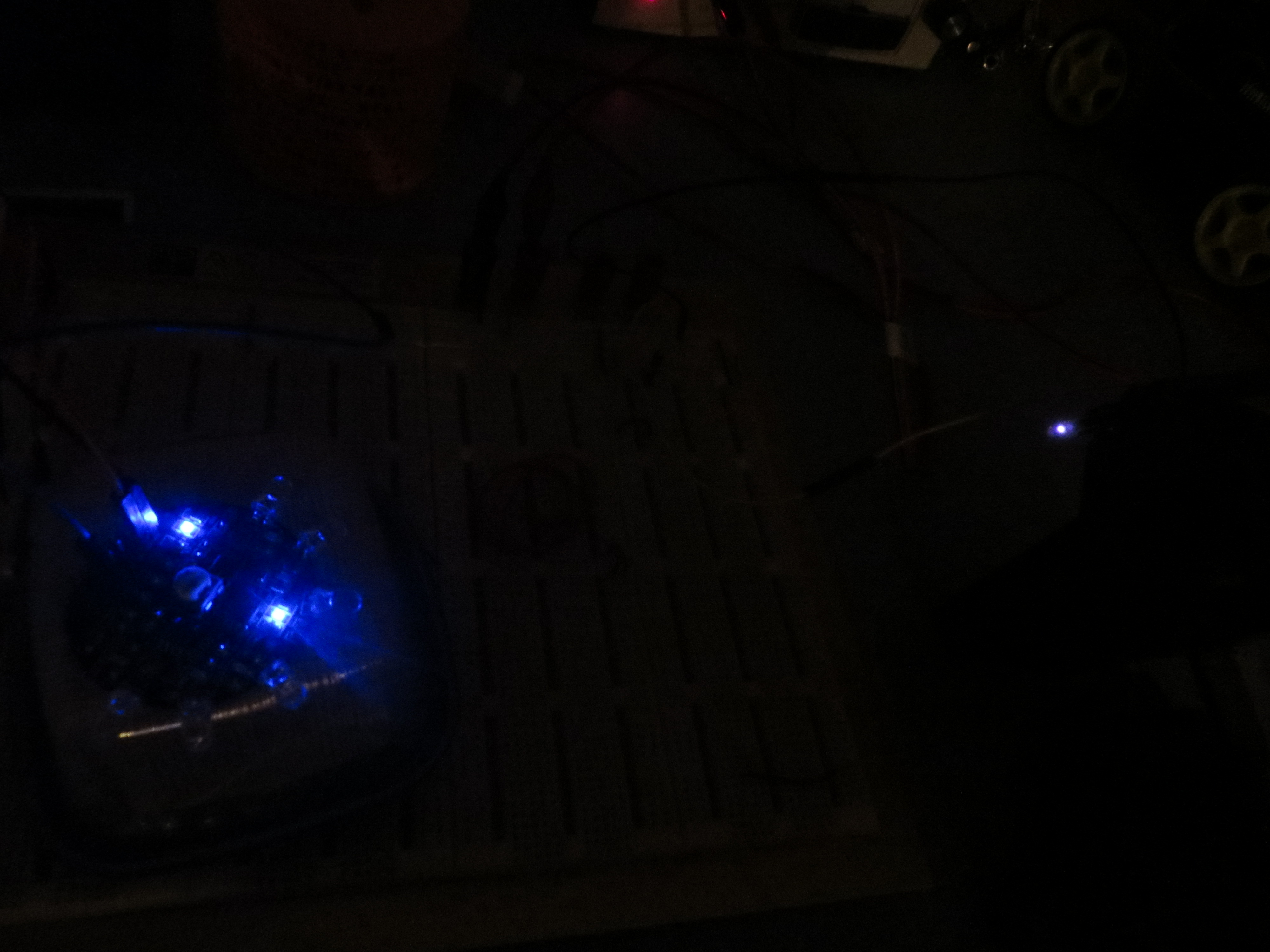 Had to turn off the lights to eliminate IR flooding.  The blue LED at upper left is the power-on indicator.  IR emitter is at far right